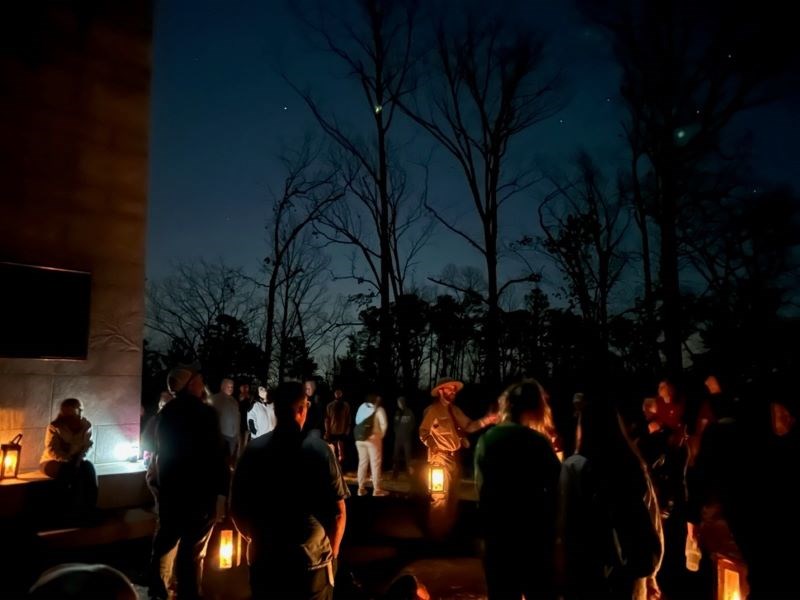 6 Lanterns are shown at night with a sign stating "Battlefield Trail 1.5mi loop