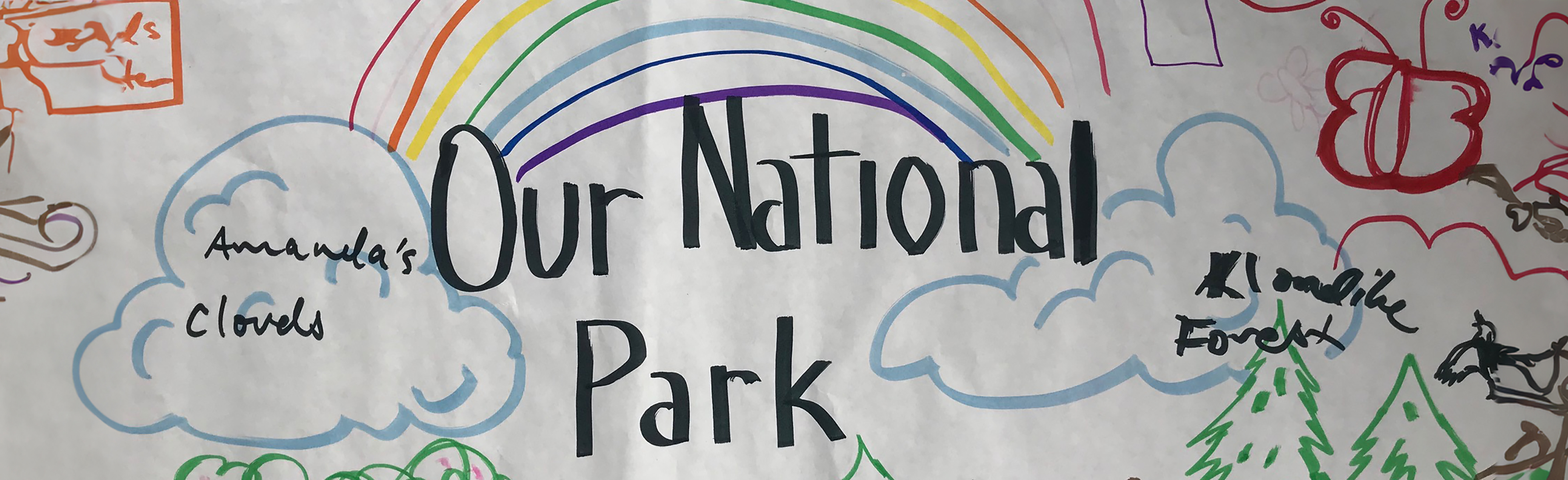 A drawing with plants, animals and words that read Our National Park.