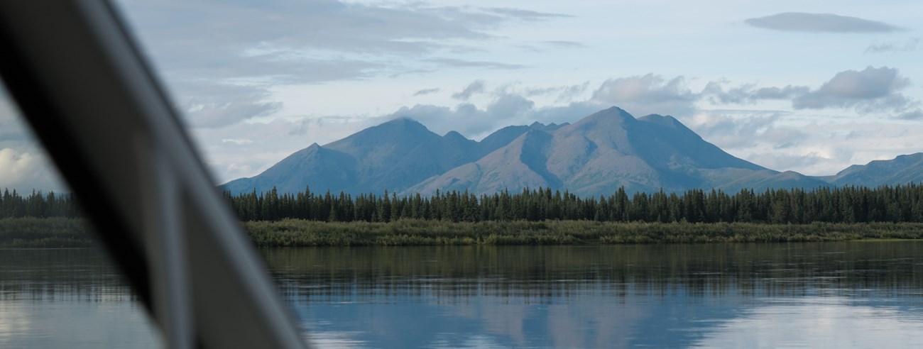 Jade mountains reflecting on the kobuk river