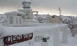Snow falls on the weather station