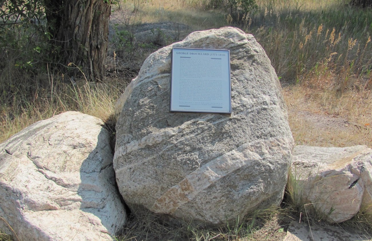 Small plack on boulder is titled George Drouillard 1773-1810