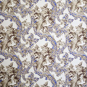 Off-white wallpaper with pattern of golden clusters of leaves and intricate curving patterned bands of ochre blue and gold