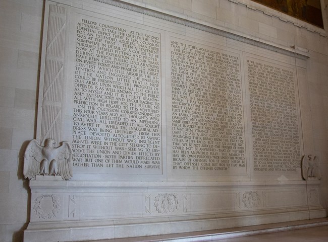 Abraham Lincoln's second inaugural address carved into the wall at the Lincoln Memorial.
