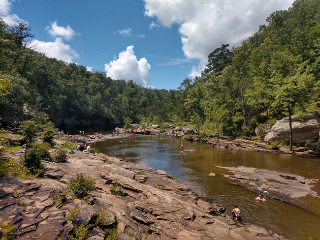 Visitors enjoying Little Falls in the Summer.