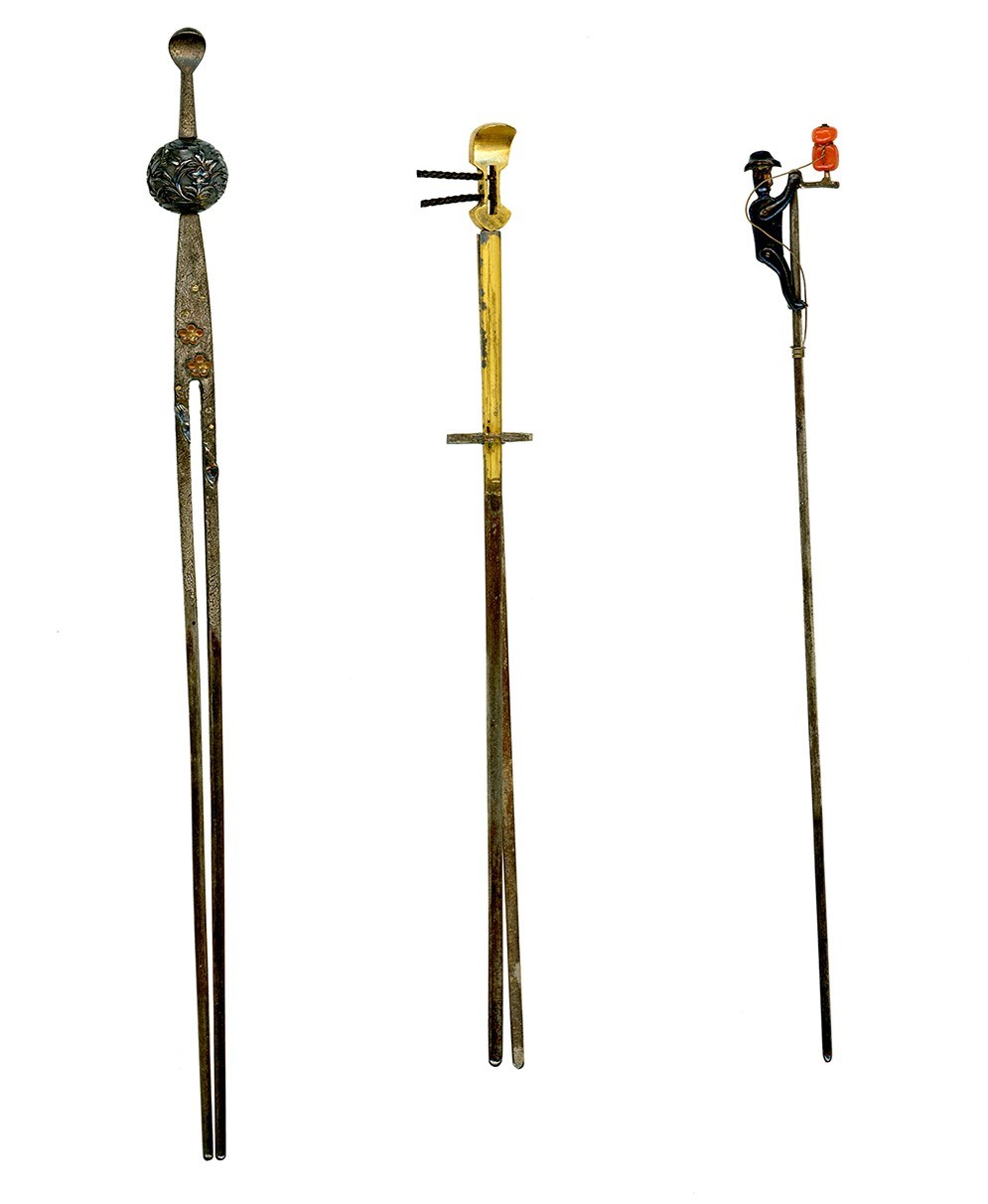 Three Japanese "kanzashi" decorative hair pins.