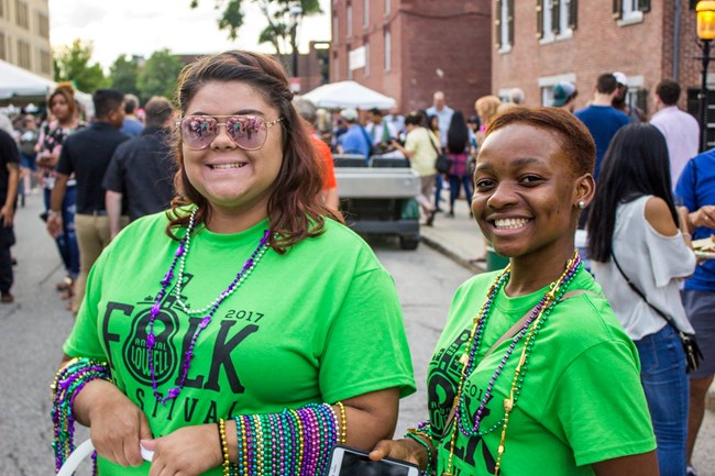 Two volunteers at the Lowell Folk Festival