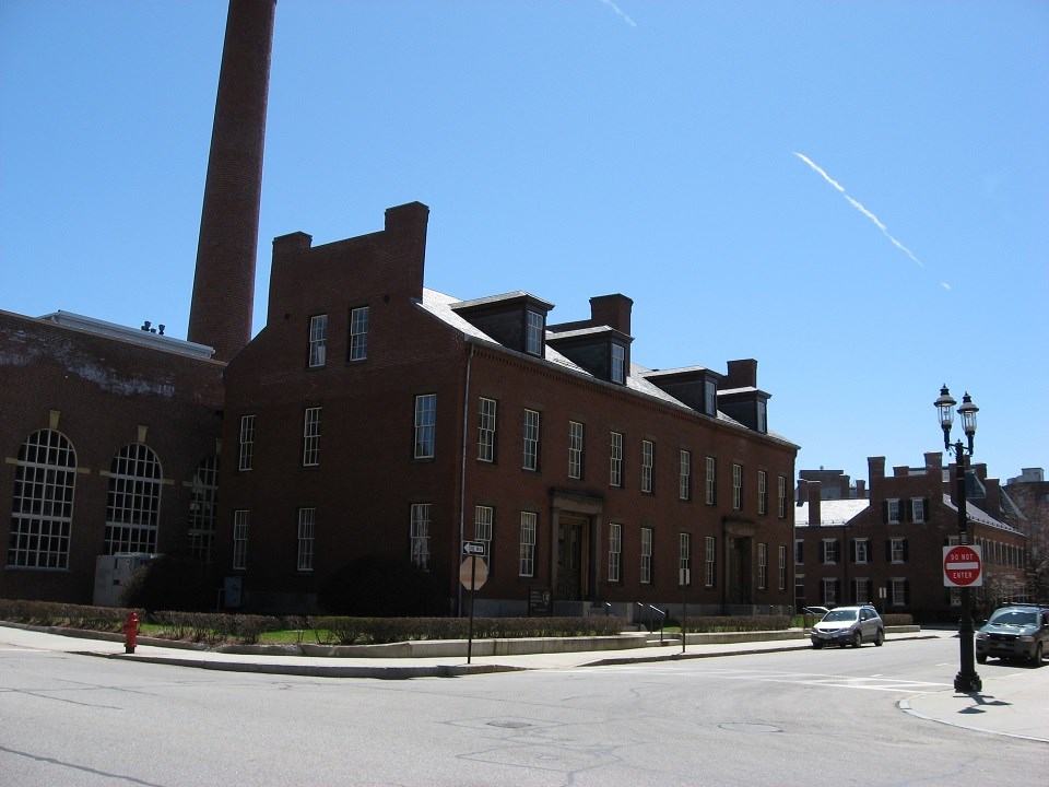 An exterior view of a historic brick agents house in downtown Lowell