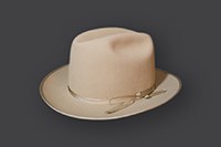 A cream colored brimmed hat.