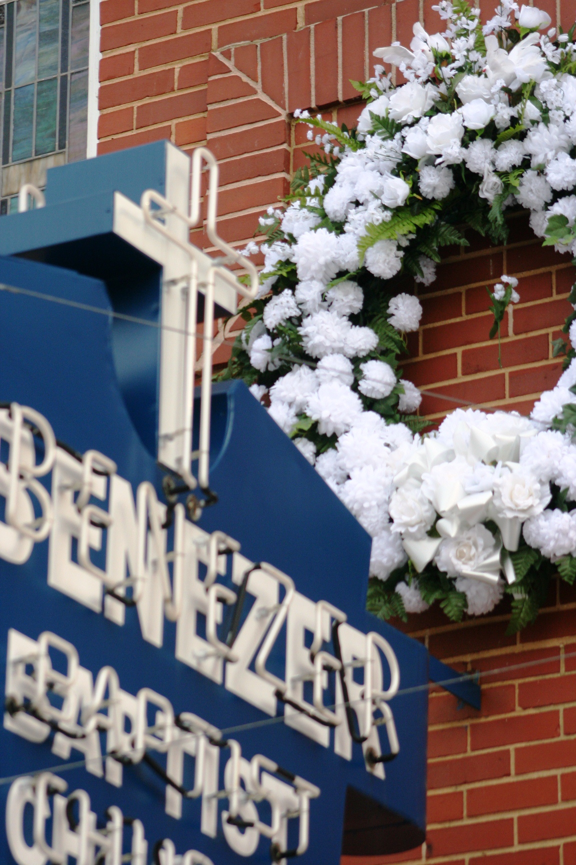 Remembrance wreath mounted on exterior of Historic Ebenezer Baptist Church.