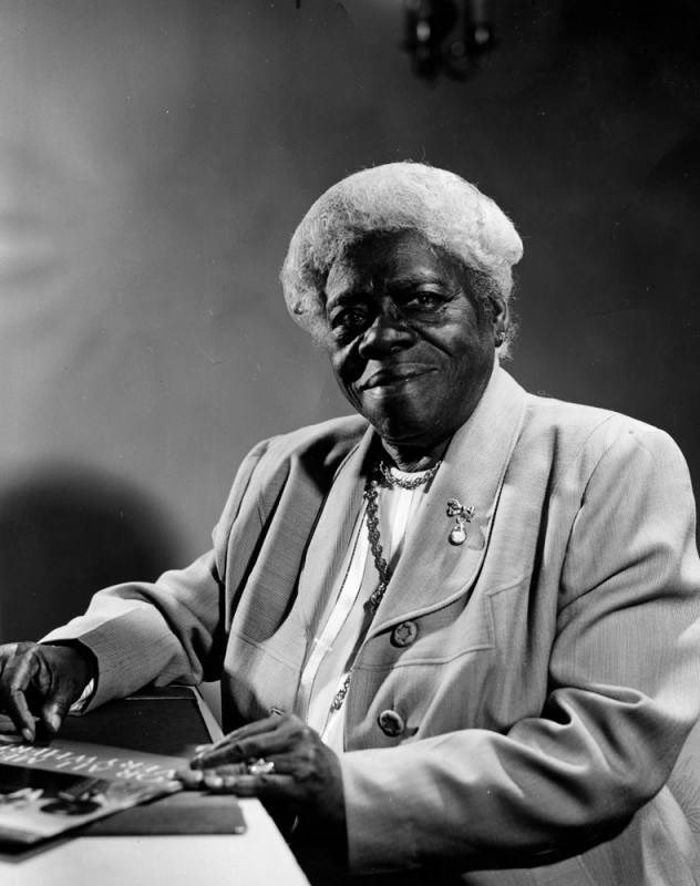 Mary McLeod Bethune smiles as she poses for a portrait