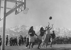 Girls playing basketball at Manzanar