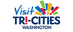 A colorful logo with confetti reads “Visit Tri-Cities Washington.” 