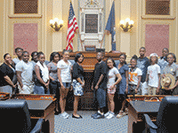 teenagers posed in the House of Delegates chamber