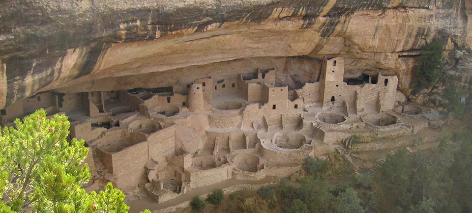 Large, multi-storied, ancient stone-masonry village in an alcove