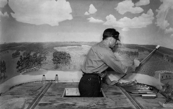 Individual working on a new diorama in the Chapin Mesa Archeological Museum