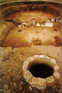 Early pithouse (semi-subterranean home) with antechamber in the foreground.  A.D. 650.