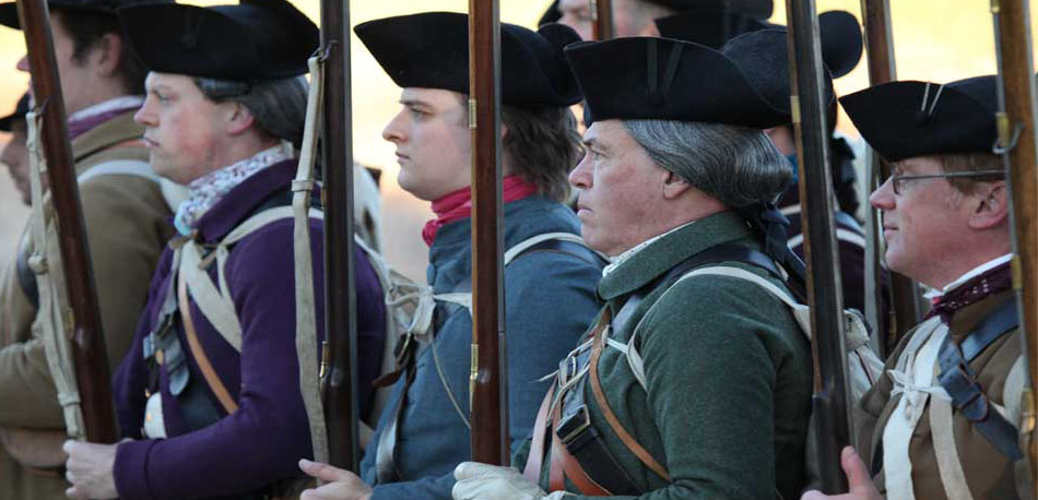 NPS volunteers portray a 1775 minute company