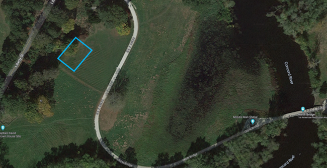 Arial photo of the North Bridge battle site with a blue box marking the location of a First Amendment Area