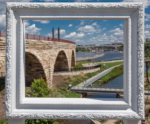 A picture frame frames an old bridge.