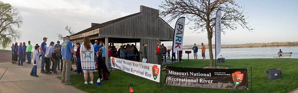 Volunteers gather for the start of the annual Missouri River Cleanup.