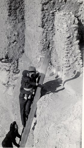 Visitors climbing the ladder into Montezuma Castle in the 1940's.