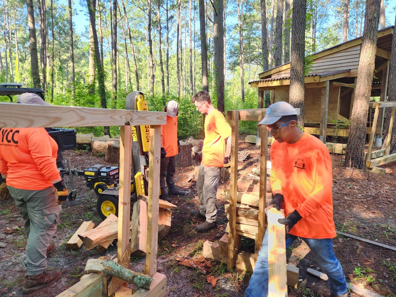YCC Interns Splitting Wood