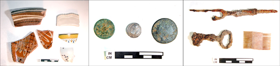 Broken pieces of pottery, coins, and a corroded key and fork.