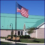 An American flag flies in front of the Monocacy Visitor Center.