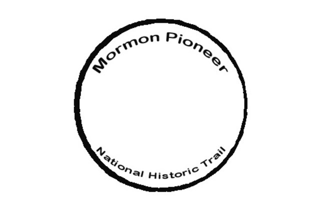 Trail name in black, small text, on the inside of a black circle.