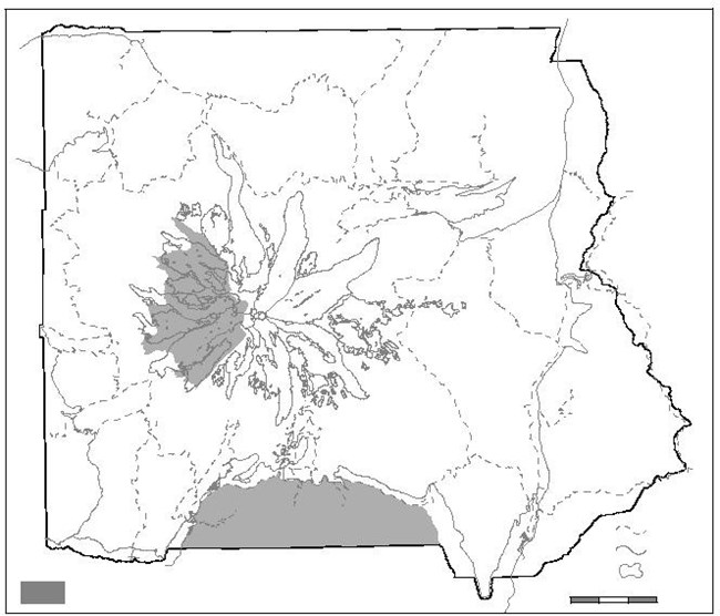 Simplified map of Mount Rainier National Park. Two sections are shaded to indicate the commercial free zones. One is south of the Tatoosh Range to the park border. The second is on the western slopes of Mount Rainier from the summit down to the glaciers.