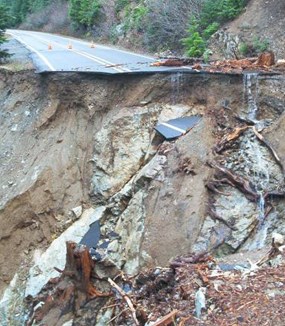 Broken roadway and landslide debris