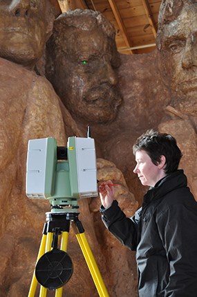 Maureen Young with Historic Scotland scans Borglum's historic model in the Sculptor's Studio.