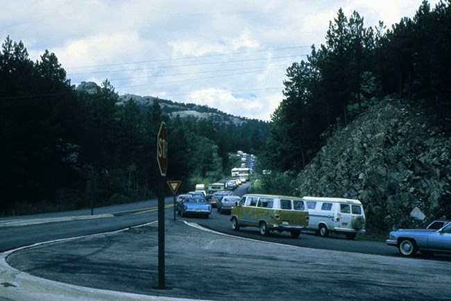 Vehicles sometimes backed up nearly three miles before the construction of the parking garage during the 1990's.