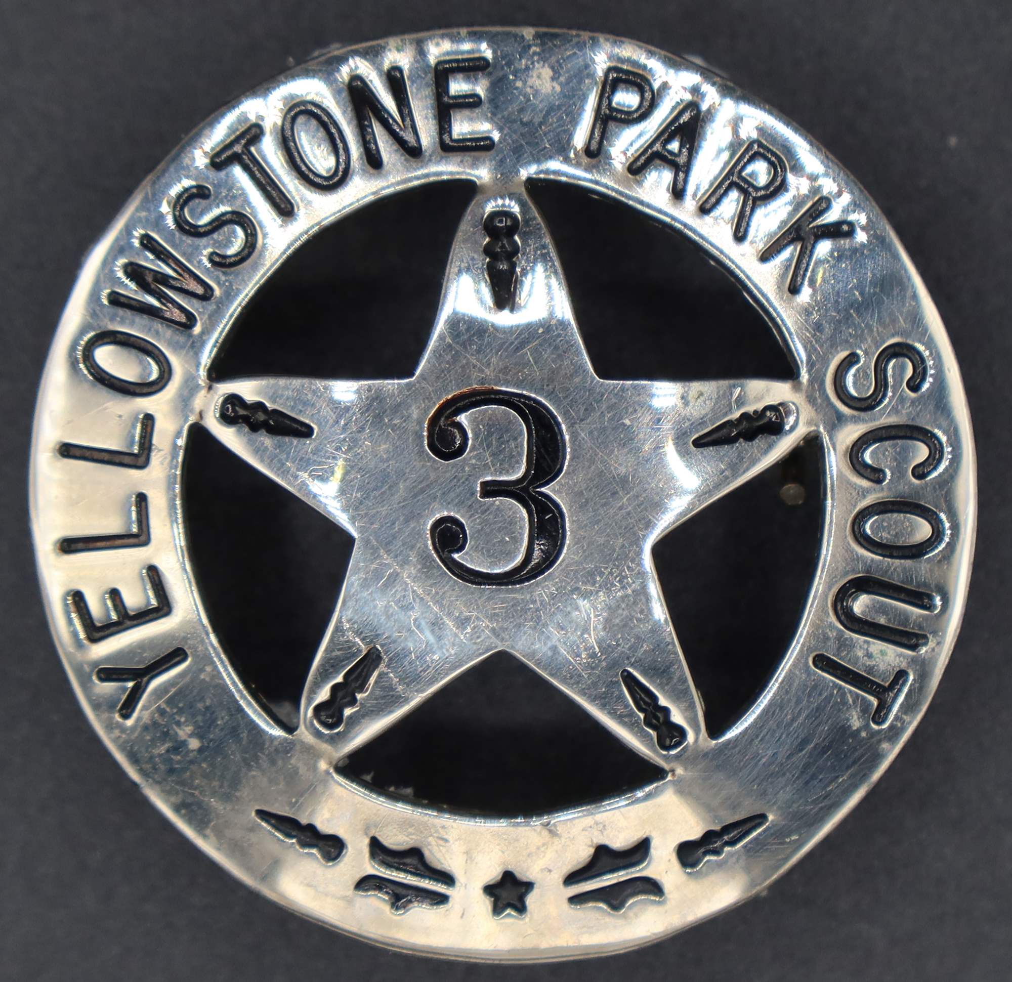 Nickel-plated metal Yellowstone Park Scout Badge