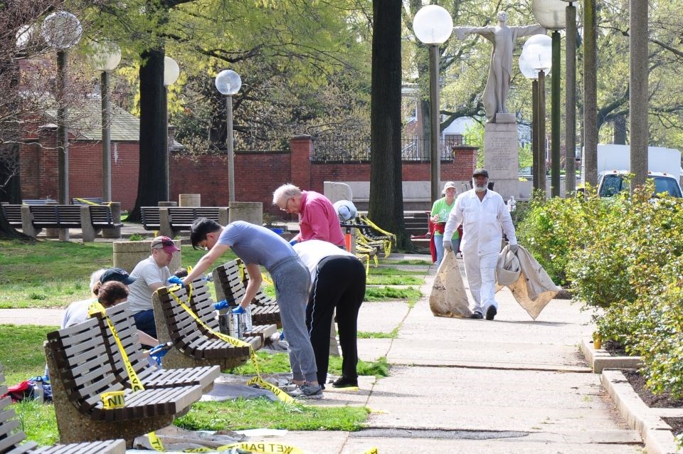 Friends of Titanic Memorial Park paint benches and clear trash from the park