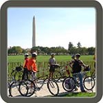 A ranger led bike tour in front of the washington monument