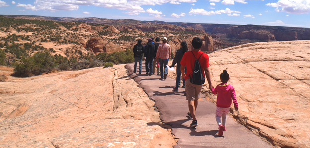 Several visitors walking on Sandal Trail