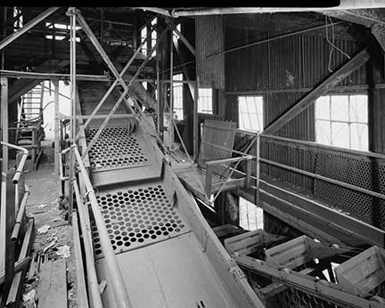 historic photo of coal seperating screens inside an old building