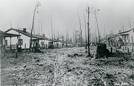 historic photo of two rows of small houses