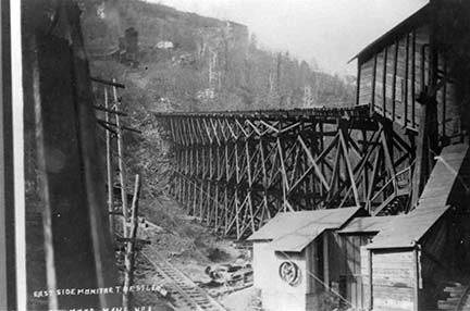 historic image of trestle and mine buildings