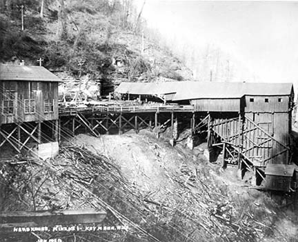 historic photo of an old mine building