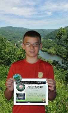 A successful Junior Ranger is awarded with a badge and a patch.
