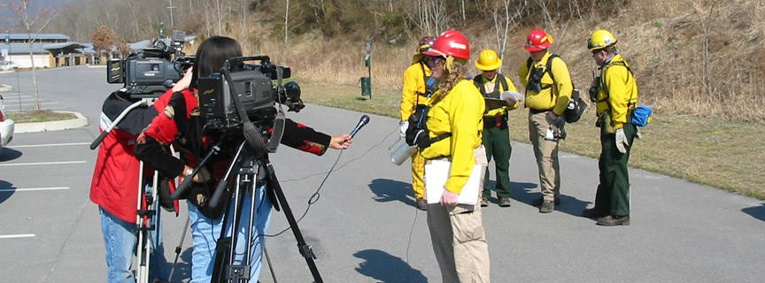 reporter conducting an interview with a firefighter