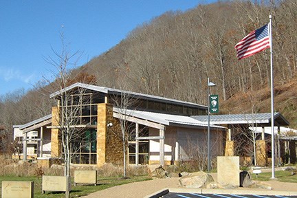 visitor center exterior with mountain behind