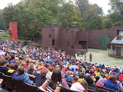 An outdoor amphitheater filled with people