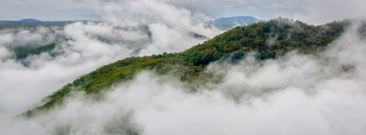 Clouds float through the gorge