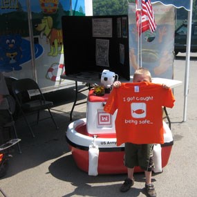 young visitor with a water safety tee shirt