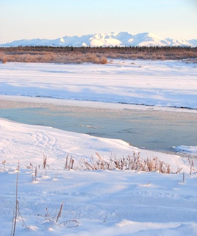 frozen river and winter landscape