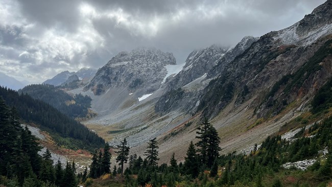 Cascade Pass in late September with snowy mountains