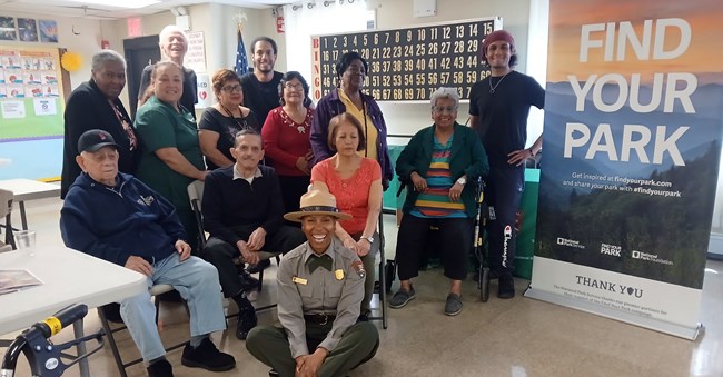 A park ranger with a group of seniors.